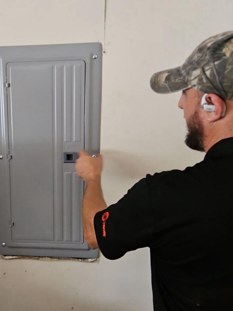 EcoGreen electrician servicing residential electrical panel in Rockwell NC